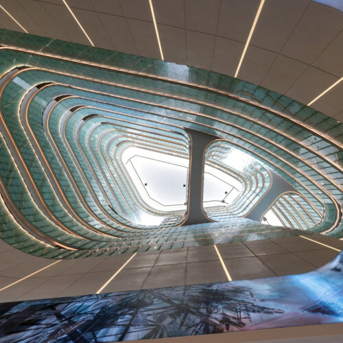 Looking up through the atrium at Atheel KAFD Hotel, Riyadh, with the We Grow artwork wrapping the LED ceiling